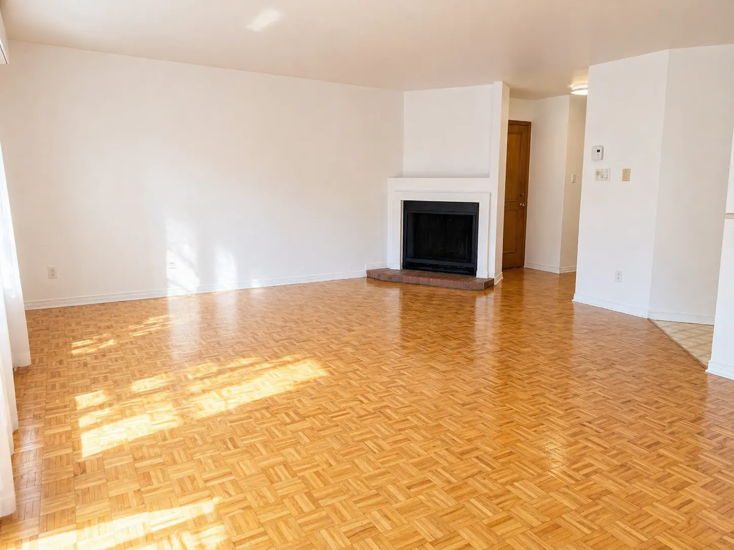 Living room second angle empty at 1490 Saint-Jacques Montreal